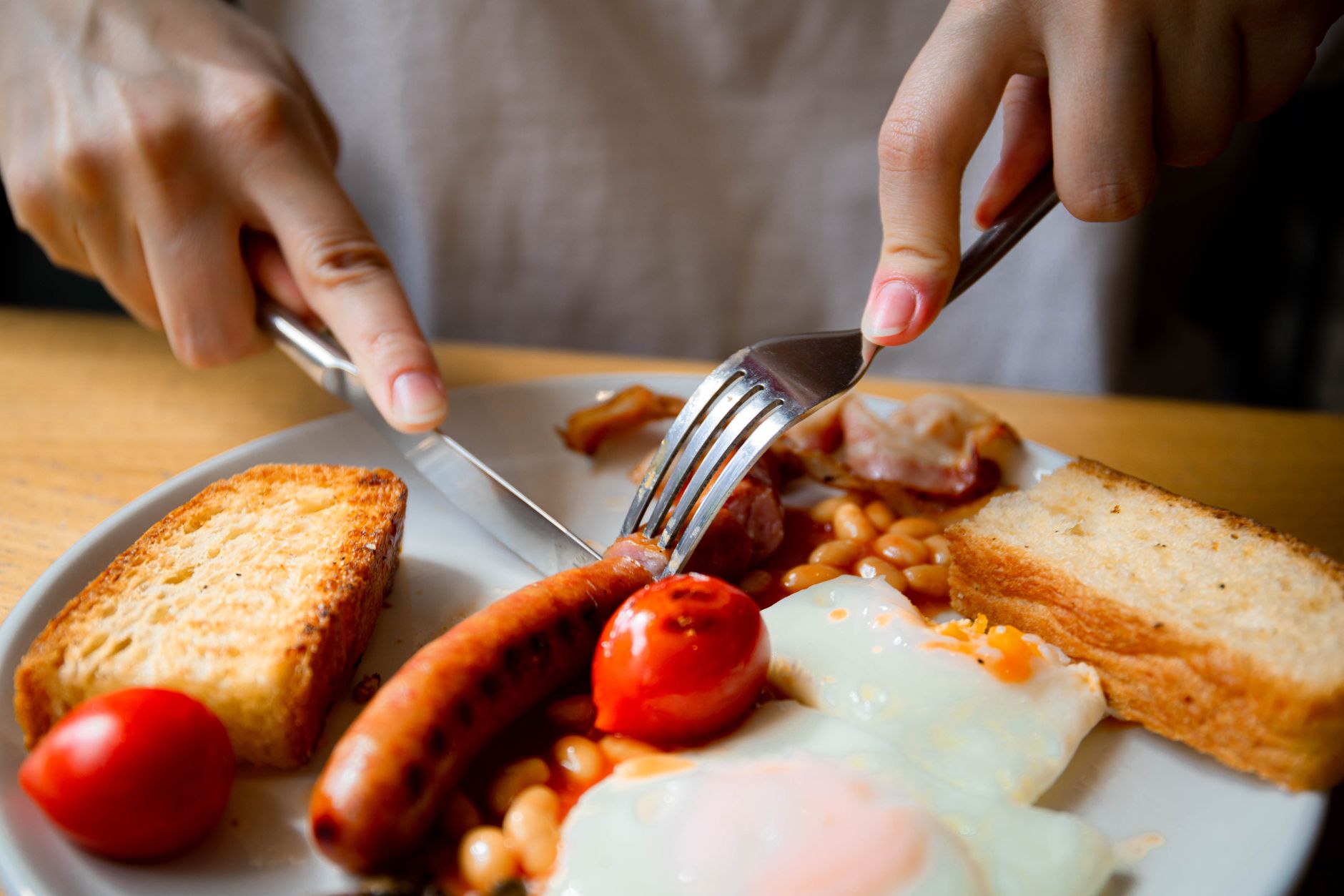 Full English breakfast at a greasy spoon near UK driving roads, a petrolhead's pre-drive meal