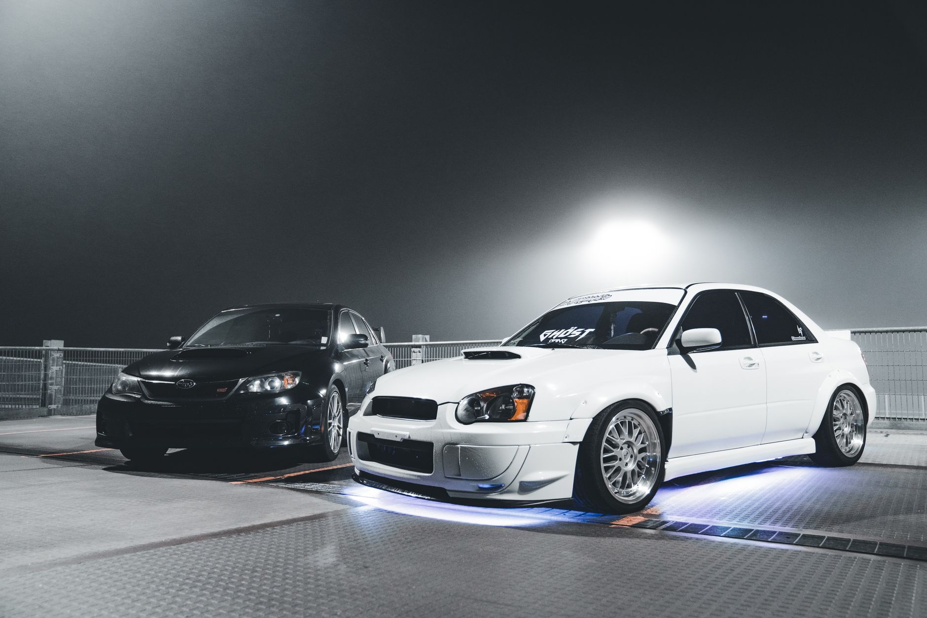 Lowered modified car at abandoned UK airfields car culture meet after dark