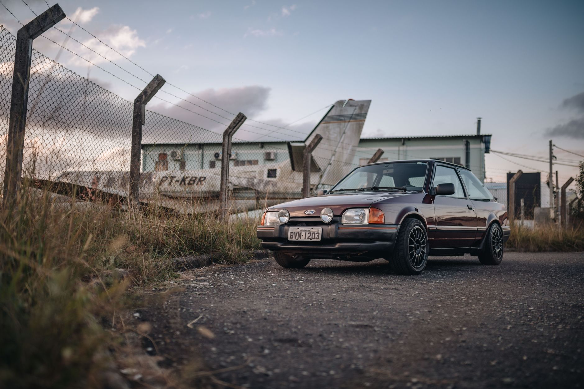 Modified cars gathered on abandoned UK airfields as part of growing car culture in 2026